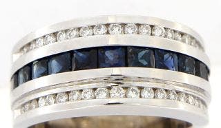PRE-OWNED 18 KARAT WHITE GOLD TRIPLE ROW SAPPHIRE AND DIAMOND RING