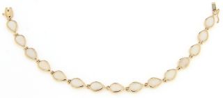 PRE OWNED 14 KARAT YELLOW GOLD MARQUISE SHAPE LAB CREATED OPAL BRACELET
