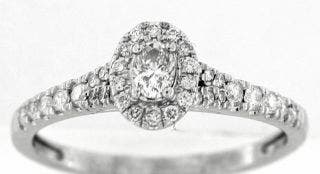 PRE-OWNED 14 KARAT WHITE GOLD OVAL HALO DIAMOND ENGAGEMENT RING