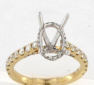 18 KARAT YELLOW AND WHITE GOLD OVAL DIAMOND SEMI MOUNT