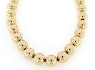 PRE OWNED 14 KARAT YELLOW GOLD 12MM HOLLOW BEAD ON FIGARO CHAIN NECKLACE