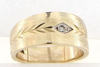 PRE OWNED 14 KARAT YELLOW GOLD TAPERED LADIES DIAMOND CUT BAND