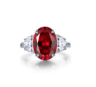 STERLING SILVER WITH PLATINUM BONDING LASSAIRE SIMULATED DIAMOND AND SIMULATED LAB GROWN RUBY CENTER STONE RING