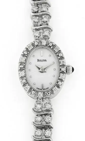 PRE OWNED 14 KARAT WHITE GOLD OVAL DIAMOND BULOVA WATCH